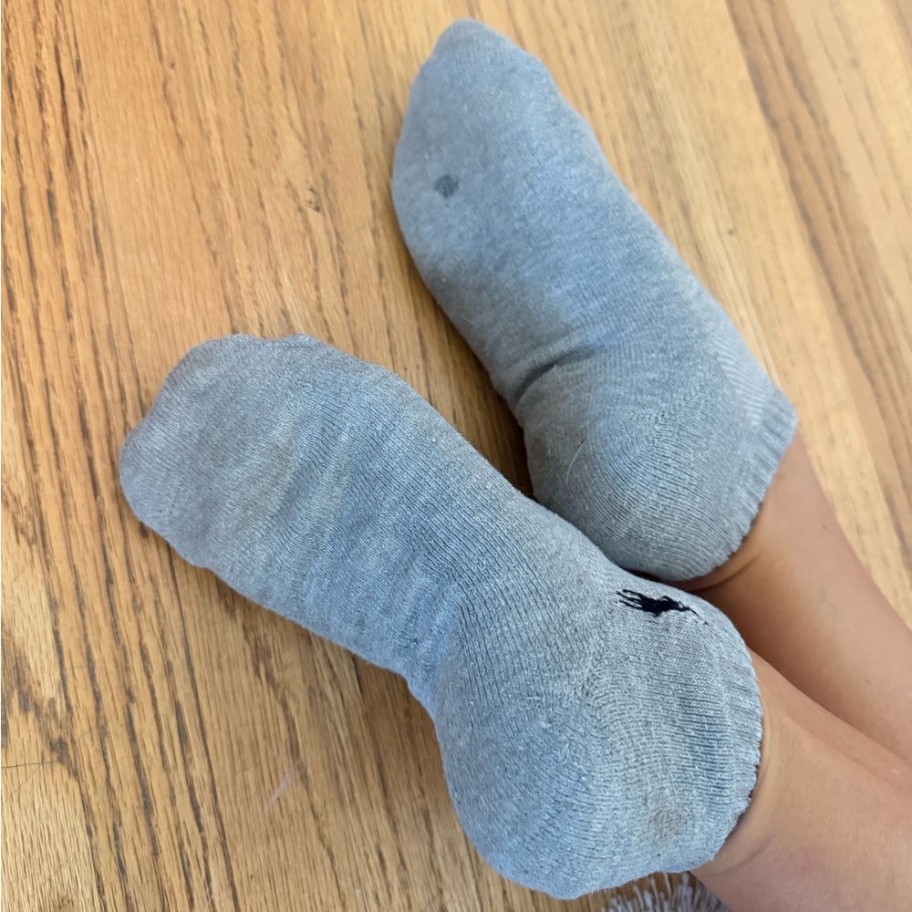 Well worn grey ankle socks